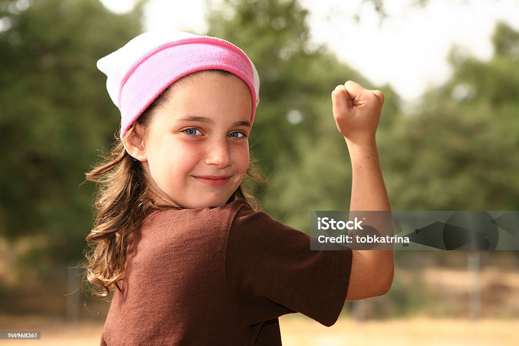 Girl Power Happy Young Girl Outdoors  Blue Stock Photo