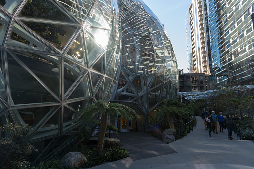 Seattle, USA - Dec 16, 2022: The Amazon Spheres in early in the morning as people visit the new headquarters.