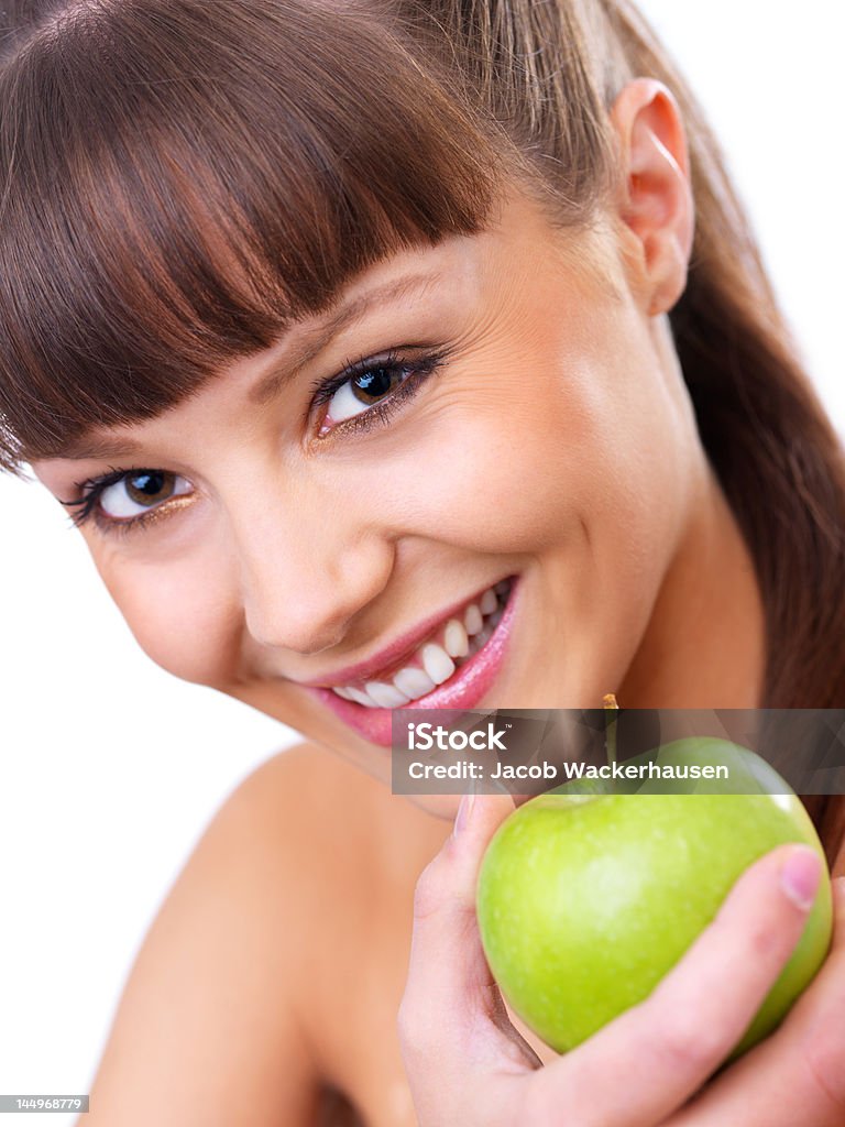 Jovem mulher segurando uma maçã verde - Foto de stock de 20 Anos royalty-free