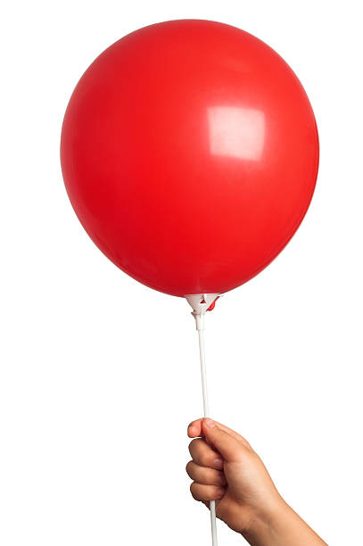 Segurando Balão Vermelho - fotografia de stock