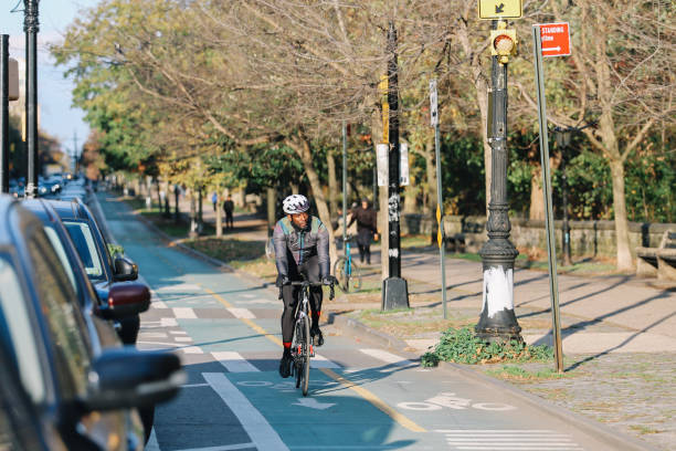 istock cyclist in Brooklyn, riding through the Prospect park 1449701996