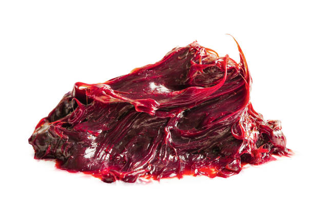 Grease isolated on white background with clipping path, red excellent water resistance synthetic lithium complex.