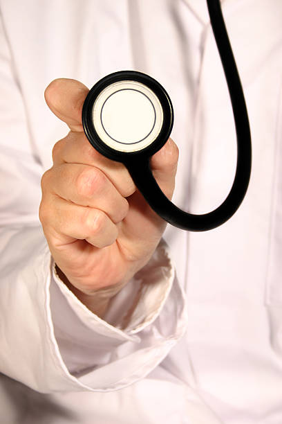Doctor with stethoscope stock photo