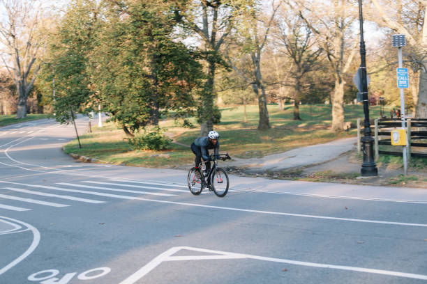 istock cyclist in Brooklyn, riding through the Prospect park 1449705968