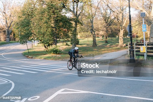 istock cyclist in Brooklyn, riding through the Prospect park 1449705968