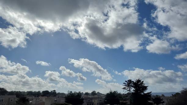 istock Cotton clouds over the city 1449708129
