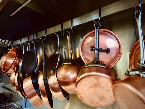 istock Copper Pots Hanging For Service at a Small Cafe 1449711291