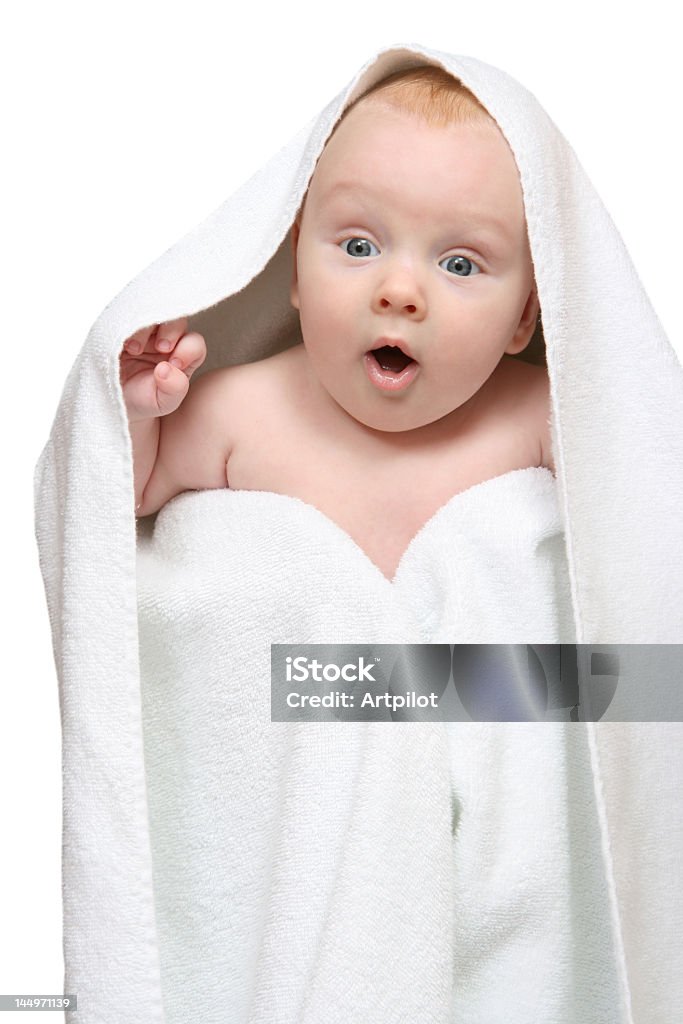 Tot under towel Tot under towel on white background. 0-11 Months Stock Photo