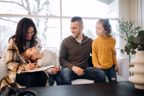istock Family Purchasing Home Signs Final Documents 1449712575