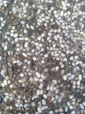 Pebbles texture on the floor.