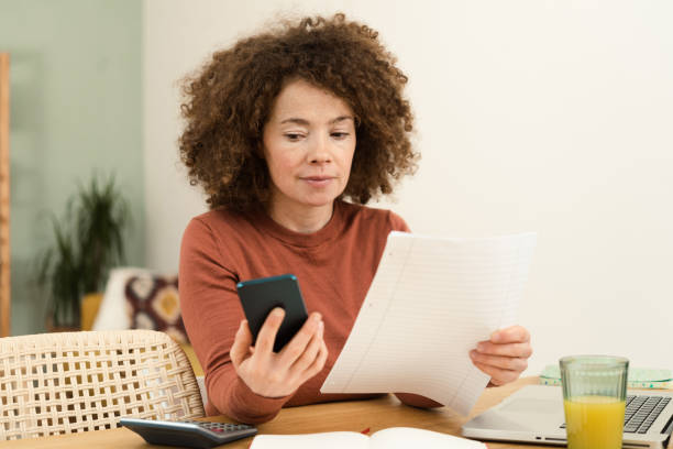 istock Young woman working from home 1449737414