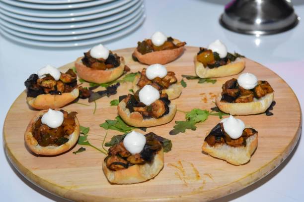 istock Closeup of appetizer crackers on a wooden table 1449742650