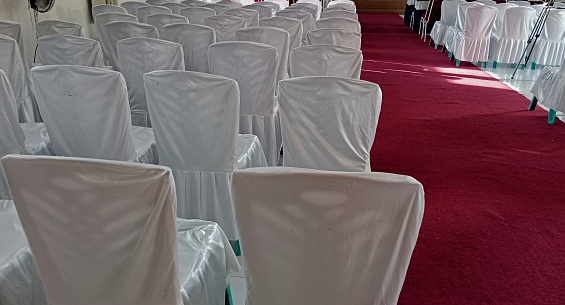 seating for an event with a red carpet stretched