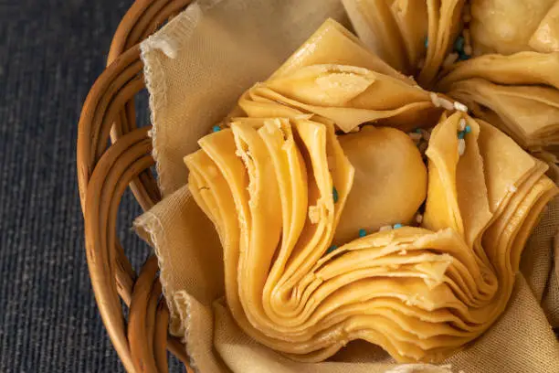 Close up of Fried pastries stuffed with sweet potato or quince. Typical Argentine food.