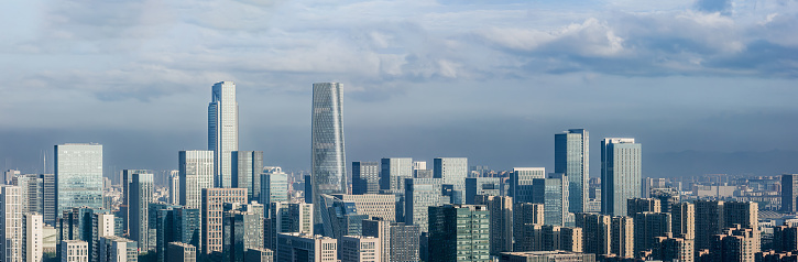 Aerial view of city skyline and modern commercial buildings in Ningbo, Zhejiang Province, China.