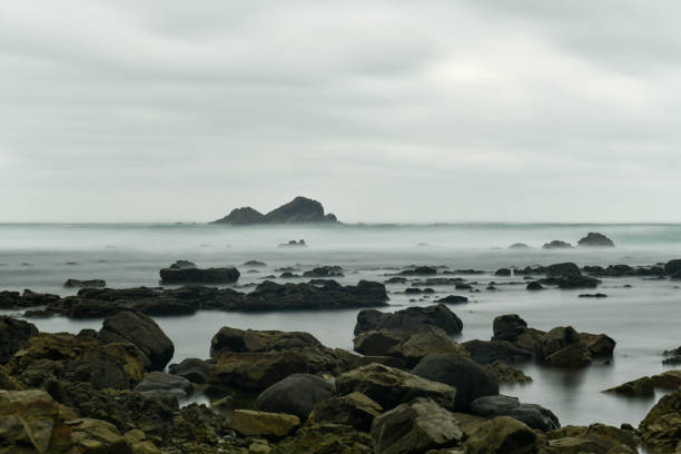 Rocks and waves at Fujairah Coast, northern most part of United Arab Emirates.