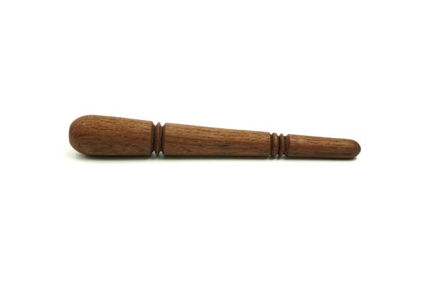 istock The image shows a handcrafted portable acupressure stick device made of solid wood on a white background, isolated. 1449768491