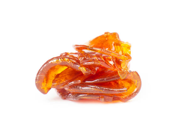 istock a pieces of cannabis wax closeup isolate on white background. concentrate dab stone with high thc 1449768603