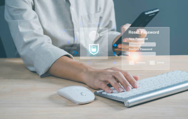 istock Businesswoman using notebook with Security and reset password login online. concept log in with smartphone to an online bank account, data protection from hacker. 1449769289
