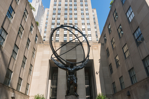 New York City, USA - August 8, 2019:Atlas is a bronze statue located in Midtown Manhattan, New York. It faces Fifth Avenue, across from St. Patrick's Cathedral.