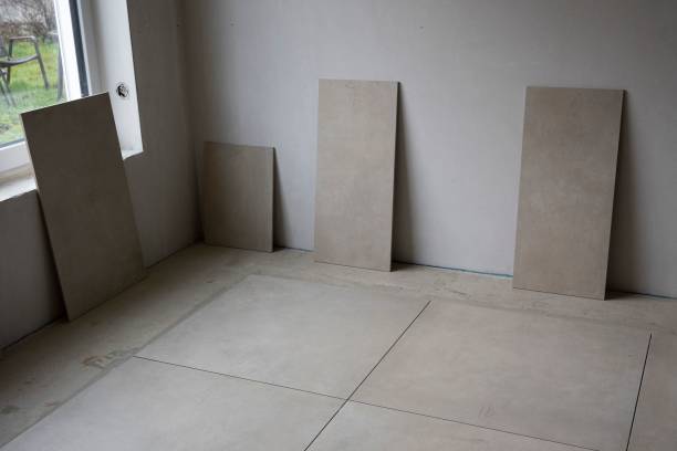 istock View of the room's interior tile installation process - house renovation 1449771644
