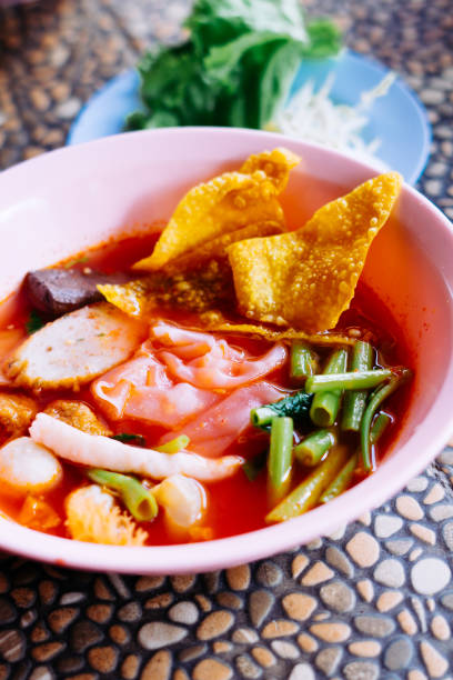 istock Close up of noodle in pink broth ( Yentafo ) 1449772407
