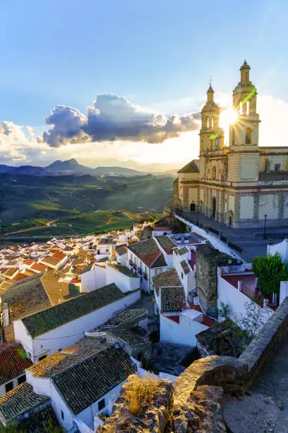 Panoramic view of the stunning white-house village of Olvera at sunset in Cadiz, Spain
