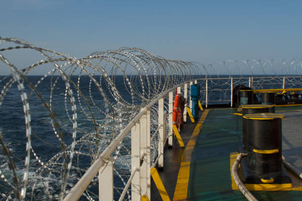 istock Vessel hardening is done with razor wire and wire fencing 1449777843