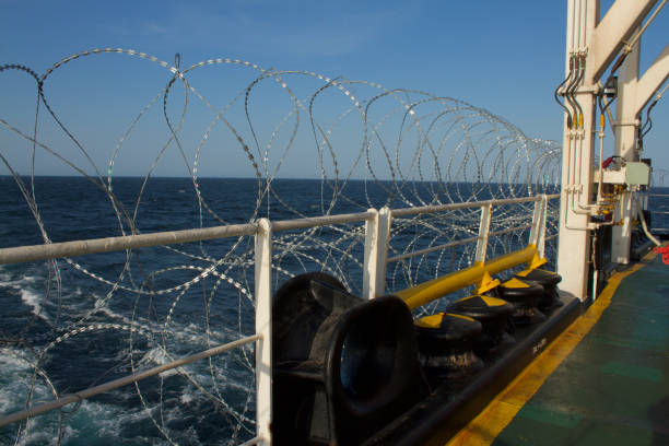 istock Vessel hardening is done with razor wire and wire fencing 1449778660