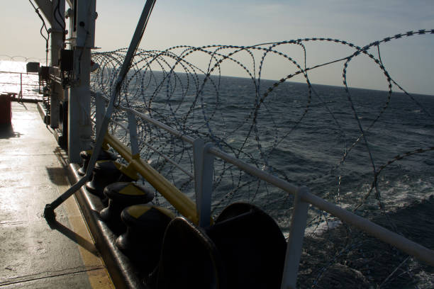 istock Vessel hardening is done with razor wire and wire fencing 1449778665