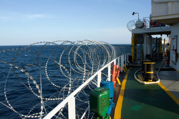 istock Vessel hardening is done with razor wire and wire fencing 1449778676