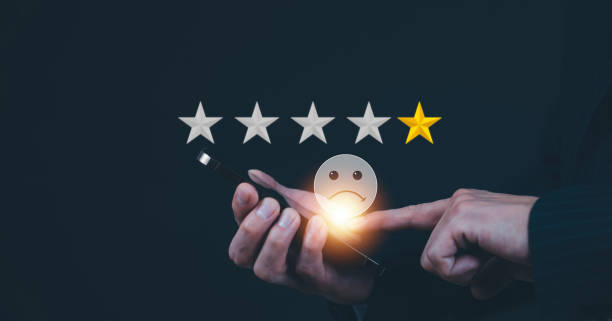 istock Man touch smartphone with Customer low review satisfaction feedback survey concept, User give rating to service experience on online application, service leading to reputation ranking of business. 1449779100