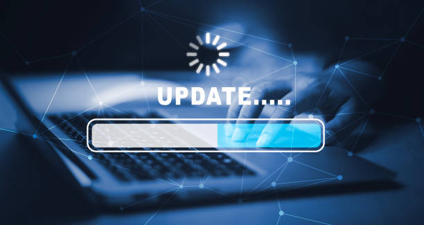 Man using laptop with Update Software Computer Program Upgrade Business Technology Internet, Update on virtual screen. Internet and technology concept, loading bar with installing the update. stock photo