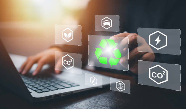 istock Businessman using laptops and touch recycle symbol with virtual modern reduce CO2 emission concept with icons, global warming emissions carbon footprint climate change to limit global warming, energy 1449779980