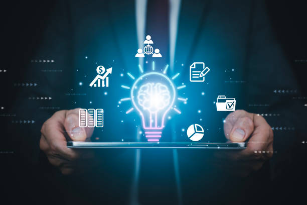 istock Innovative technology in science and communication concepts, and Creativity with glowing light bulbs.Hand hold light bulb with new idea concept with innovation, the new idea with energy and power 1449780028