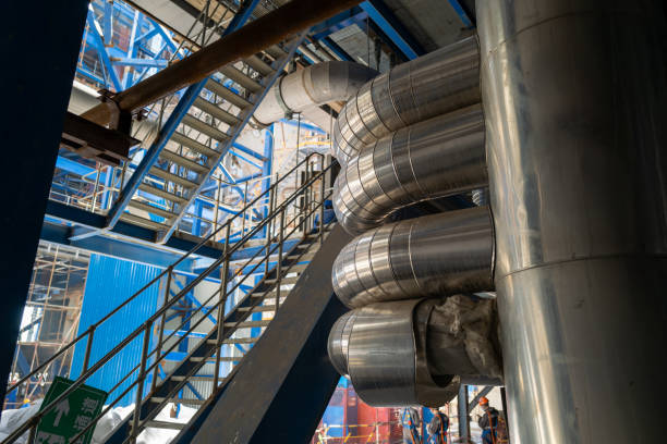istock Boiler steam pipes in power plant 1449783767