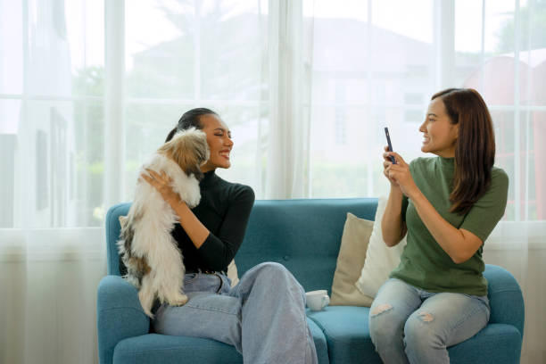 istock Women stay at home with their dog. 1449784620