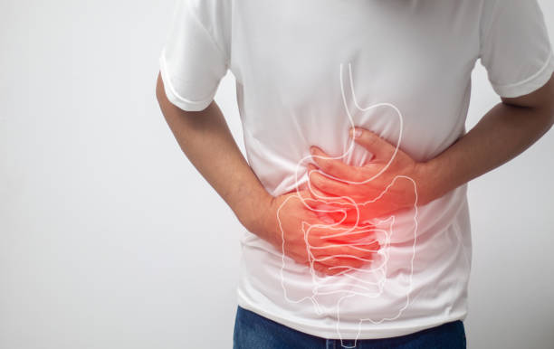 istock man having abdominal pain on white background 1449788169