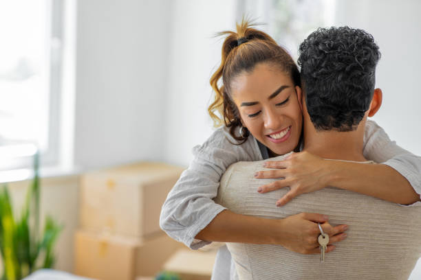 istock Happy couple in their apartment 1449788940