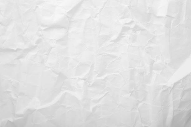 istock Abstract white paper crease or crumpled texture background. 1449791374