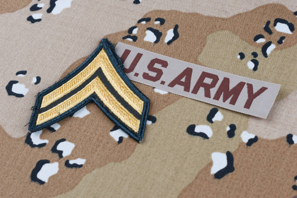 istock US ARMY battle dress uniform with corporal rank patch 1449795502