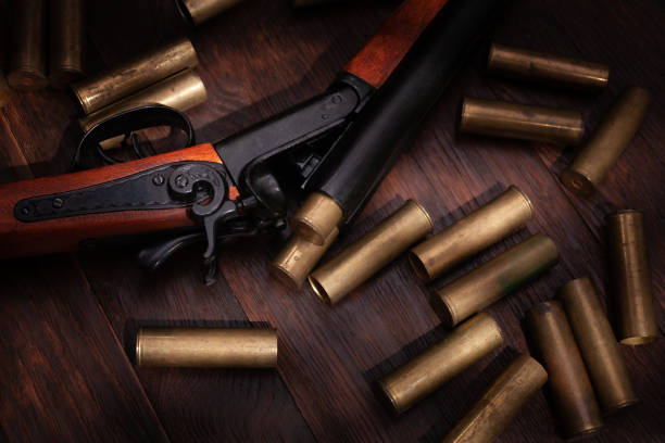 istock Vintage retro shotgun with brass cartridges 1449796045