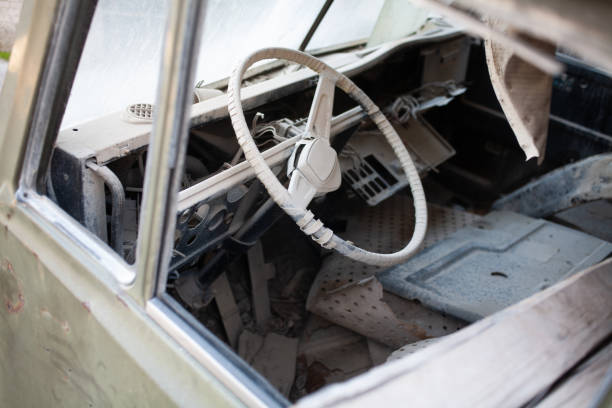 istock Broken abandoned rusty old vehicle. Retro damaged transportation. 1449796201