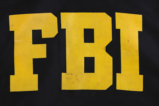 FBI raid jacket black uniform background