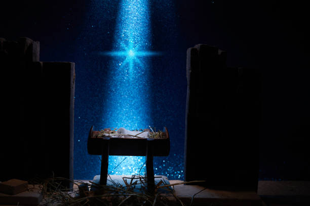 istock Nativity of Jesus, empty manger at night with bright lights. 1449804964