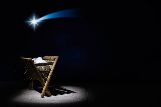 istock Nativity of Jesus, empty manger at night with bright lights. 1449805576