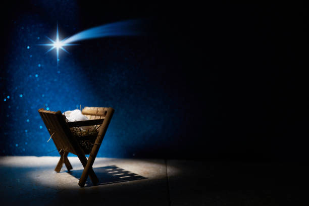 istock Nativity of Jesus, empty manger at night with bright lights. 1449805791