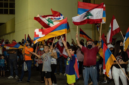 beiur, Lebanon – October 09, 2020: A crowd of people holding flags at a meeting to support Artsakh during the war in 2020