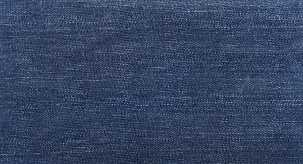 textura de jeans dark blue para el fondo. fondo de mezclilla - chaqueta tejana fotografías e imágenes de stock