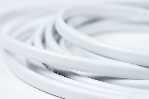 istock closeup of a white electric cable on a white background 1449816304